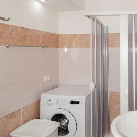 Attico Con Terrazzo Apartmán